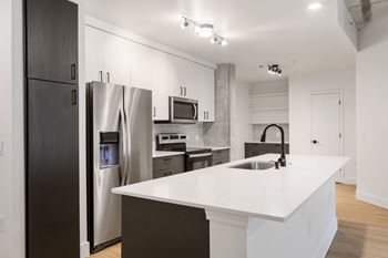 Double-door refrigerator with dual ice and water dispenser*